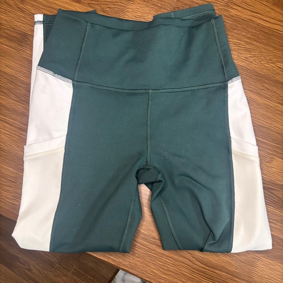 Fabletics On-The-Go PowerHold® High-Waisted Capri Leggings Deep Sea Green - Picture 3 of 8